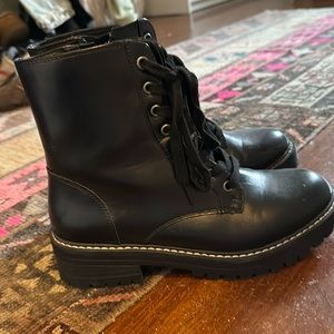 Black shiny combat boots